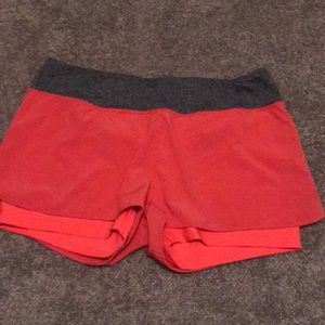 Running shorts with spandex shorts lining